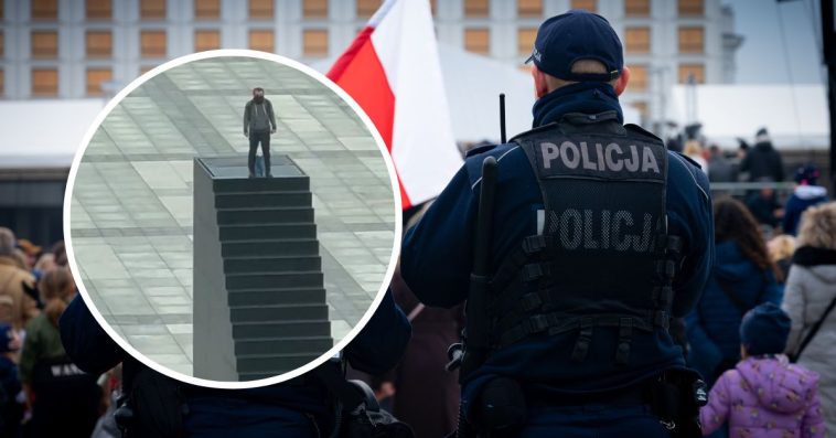mężczyzna wszedł na pomnik smoleński warszawa bomba