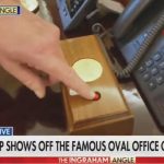 czerwony guzik atomowy trump